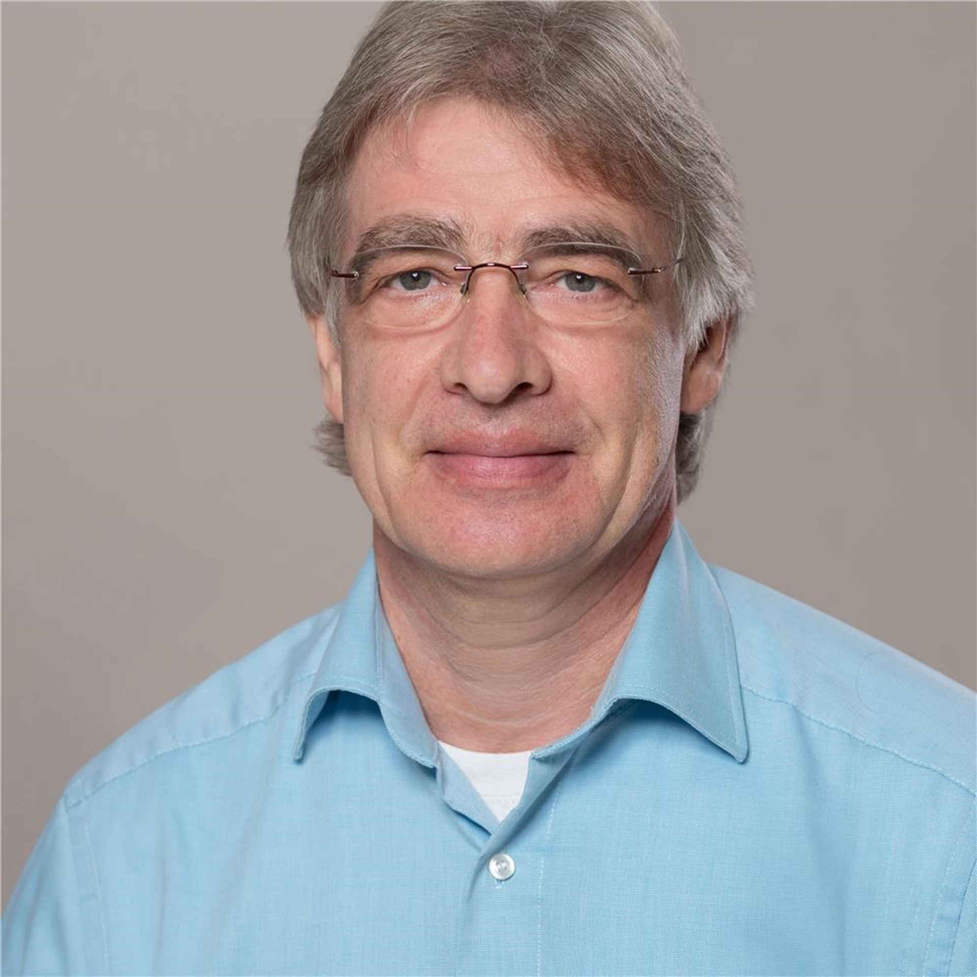 Portrait von Pflegedienstleiter Christian Günther, Caritas-Pflegestation Düren